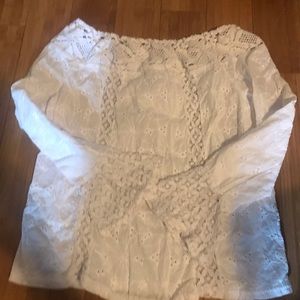 Size XS white eyelet/lace top! Worn on or off shoulders. Excellent condition.